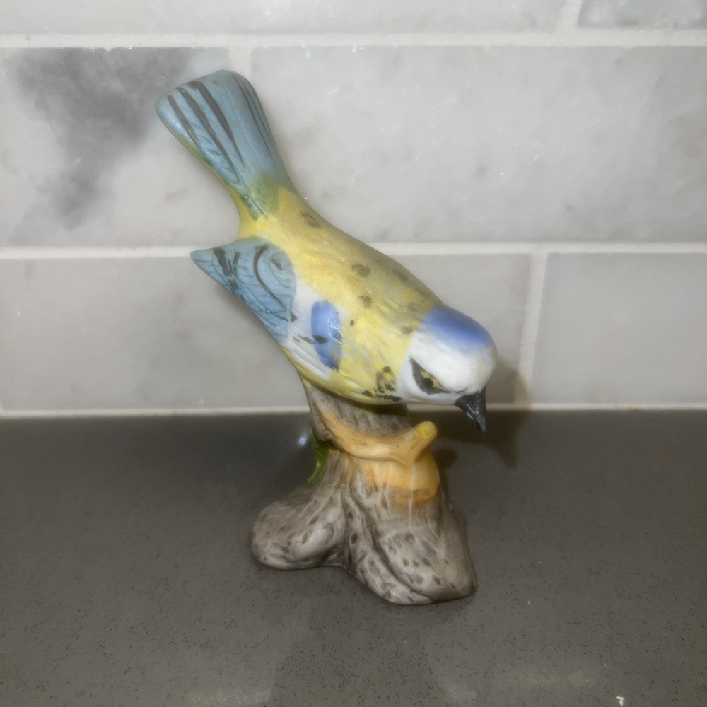 VTG-1984 Yellow Bird Porcelain Bisque 4" Tall Stunning Blue Tip on Branch EUC